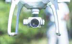 Delegated Anonymous Credentials with Revocation Capability for IoT Service Chains